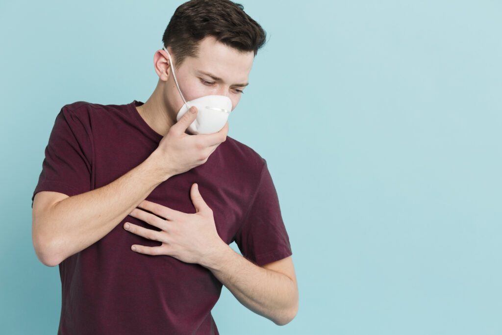Man using asthma inhaler at Rashtrotthana Hospital Bangalore